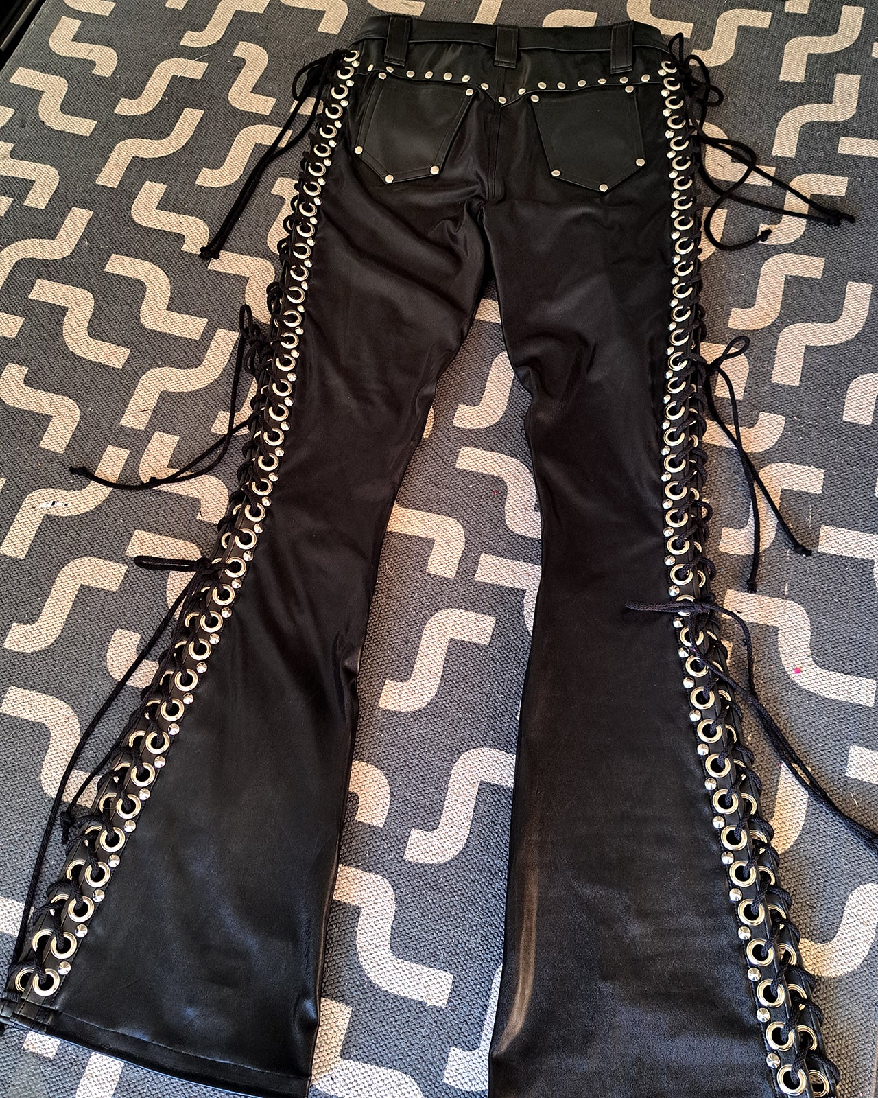 Mid Rise Wet Look Heavy Metal Buckle Strap Pants (Size L)