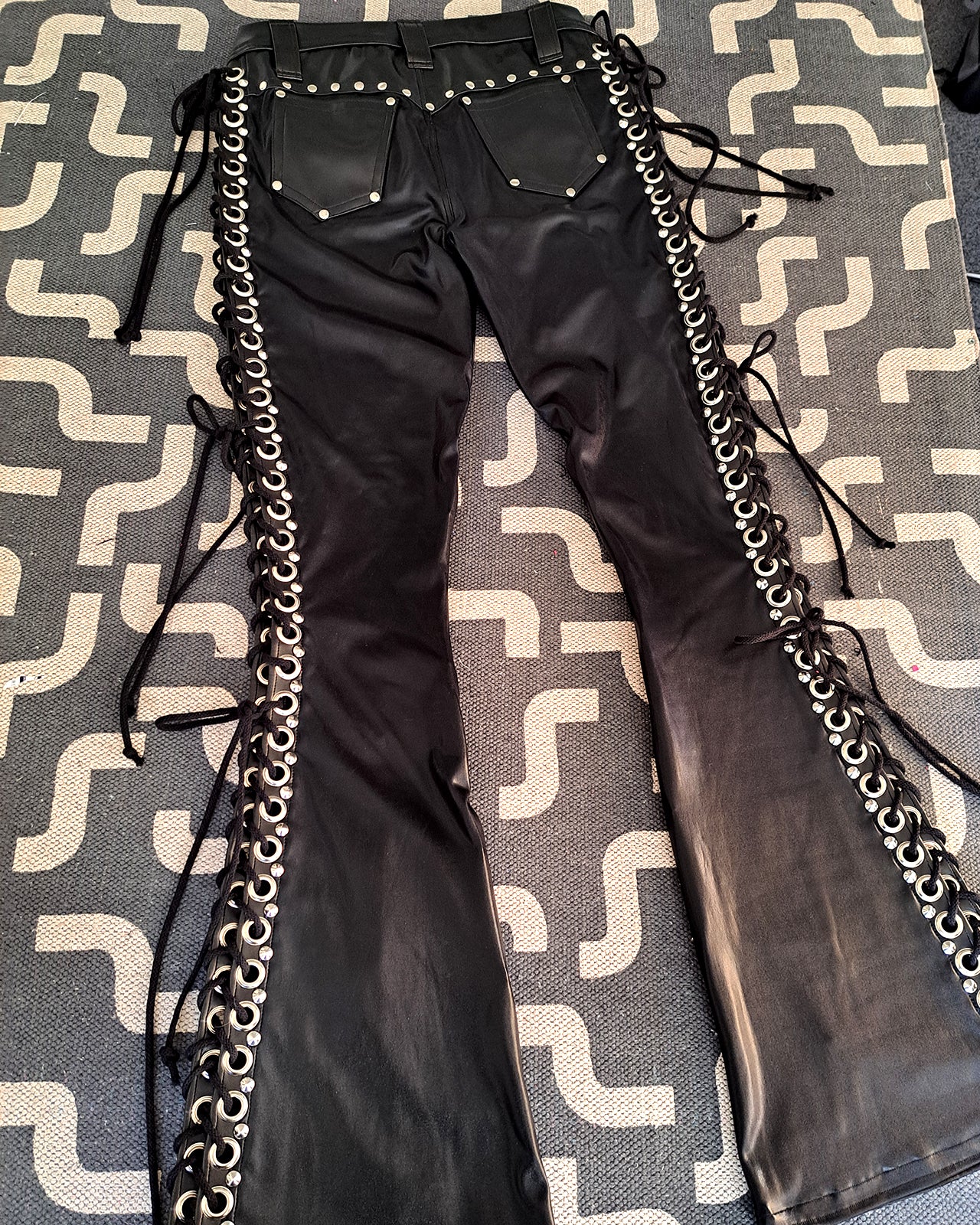 Mid Rise Wet Look Heavy Metal Buckle Strap Pants (Size L)