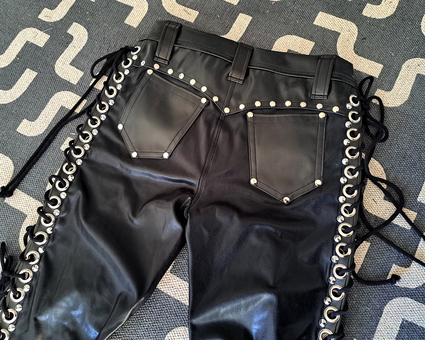 Mid Rise Wet Look Heavy Metal Buckle Strap Pants (Size L)