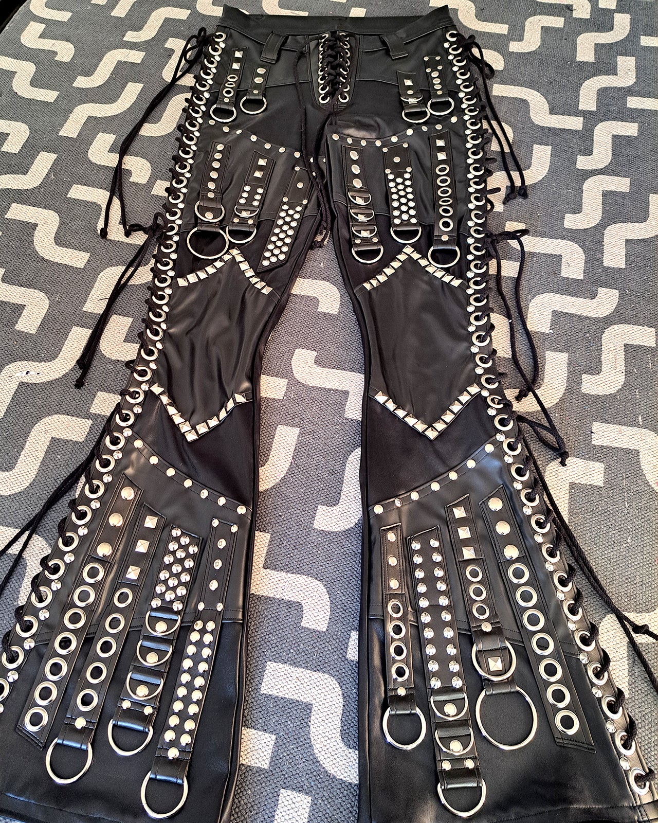 Mid Rise Wet Look Heavy Metal Buckle Strap Pants (Size L)