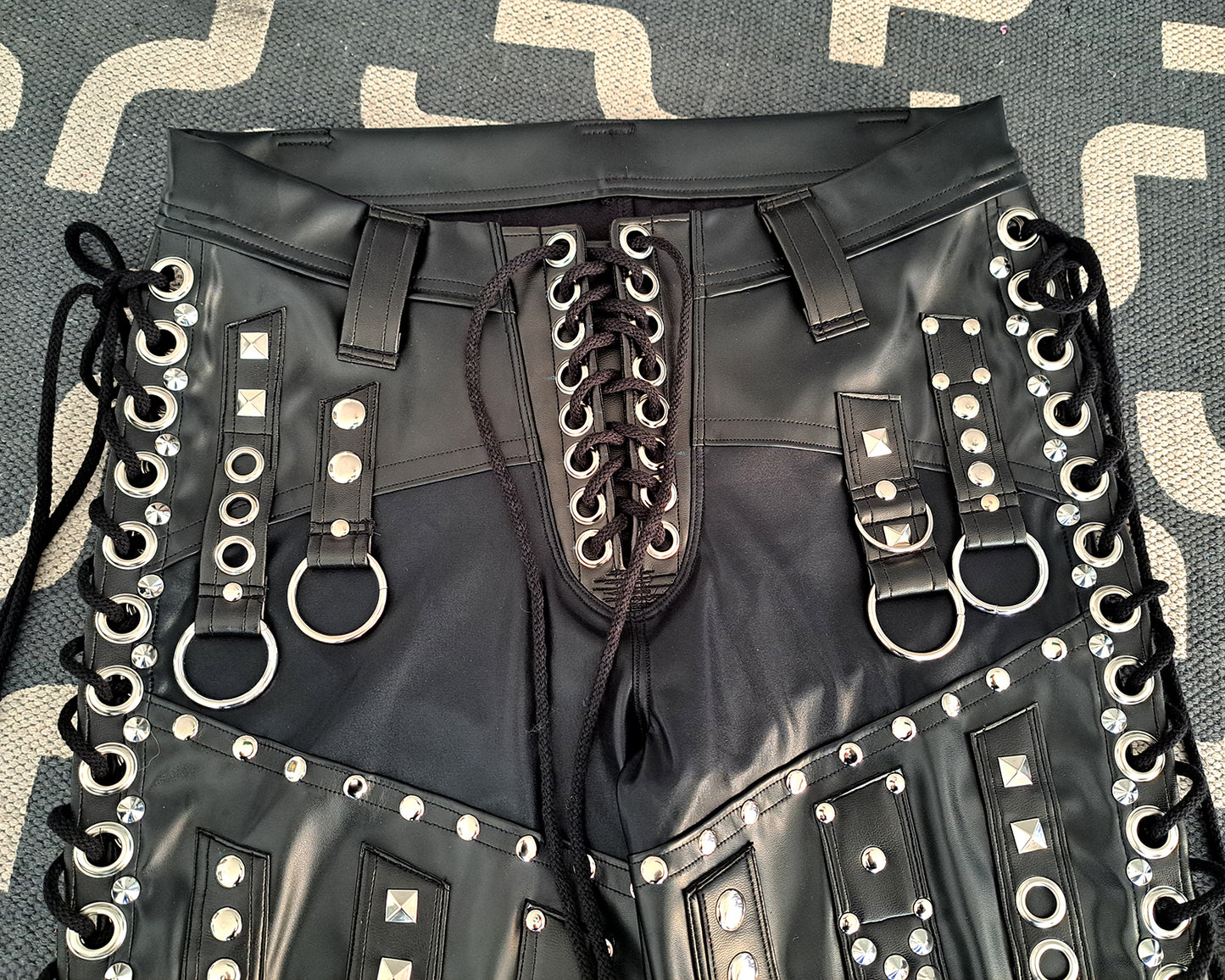 Mid Rise Wet Look Heavy Metal Buckle Strap Pants (Size L)