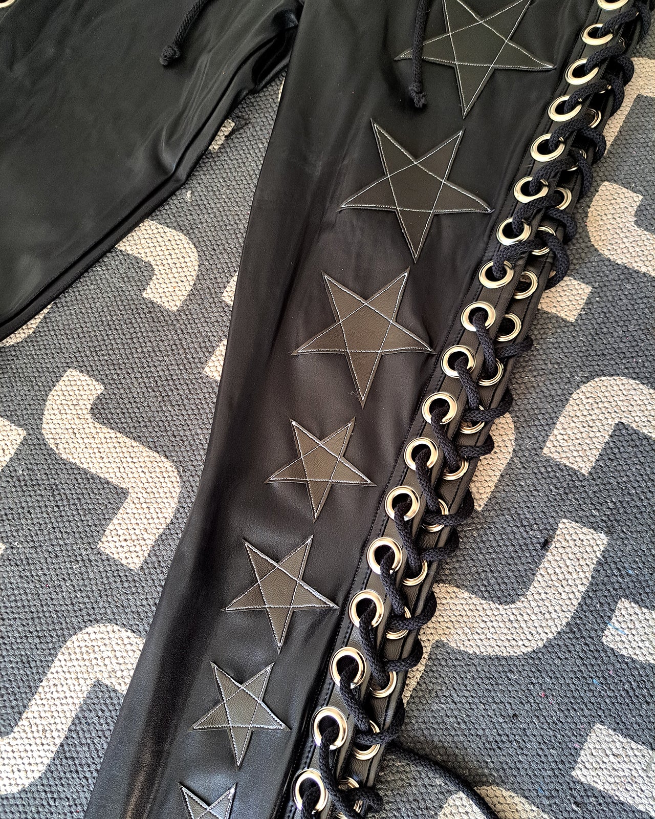 Wet Look Black Lace up Star Pants (Size M/L)